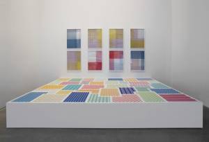 Michelle Grabner. Untitled, 2014. Paper weavings, pedestal. 20 x 156 x 108 in (50.8 x 396.2 x 274.3 cm). Courtesy of the artist and the James Cohan Gallery.